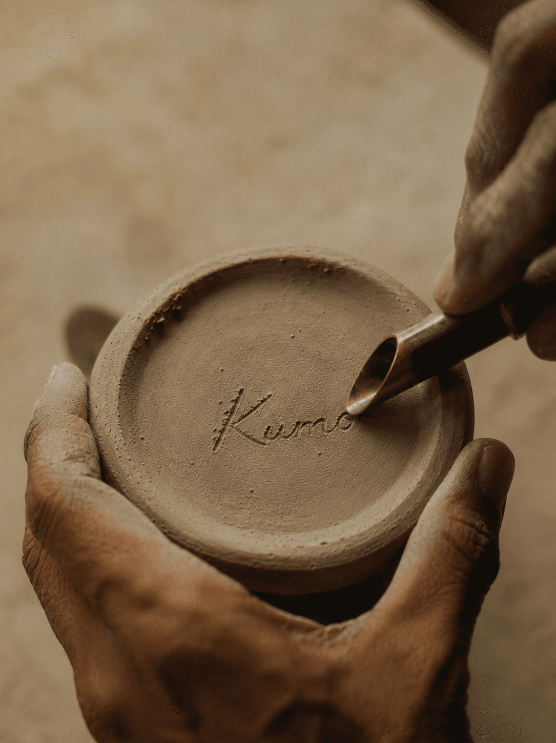 Indian artisan shaping handmade ceramic, the kind of maker Kumo partners with